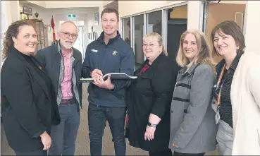  ?? Picture: PAUL CARRACHER ?? HEALTH ACCESS: From left, Lister House Horsham’s Amanda Wilson and David Wilson, Horsham College’s Hamish Roberts, Sharon Hedt, Lister House, Kim Hutton, Western Victoria Primary Health Network, and Louise Amor, Horsham College, discuss the return of a Doctors in Secondary Schools program at Horsham College.