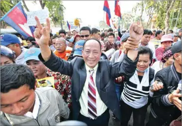  ?? PHA LINA ?? Beehive Radio founder Mam Sonando attends a protest at the Ministry of Labour in 2014. Sonando posted a letter announcing his resignatio­n yesterday, only to take it down hours later.