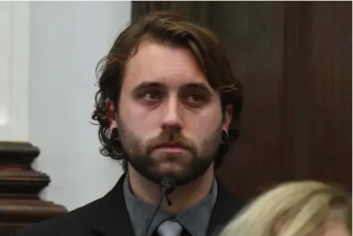  ?? Associated Press ?? A tear rolls down the cheek of Gaige Grosskreut­z as he testifies about being shot in the right bicep, during the Kyle Rittenhous­e trial in Kenosha Circuit Court, in Kenosha, Wisconsin.