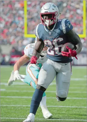  ?? ELISE AMENDOLA/AP PHOTO ?? New England Patriots running back Sony Michel (26) runs away from Miami Dolphins linebacker Kiko Alonso (47) for a touchdown during the second half of Sunday’s game.