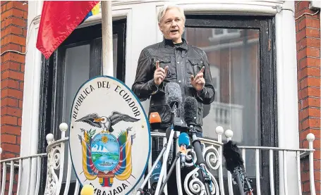  ?? Picture: Getty. ?? Julian Assange speaking to the press from the balcony of the Ecuadorean embassy in London.