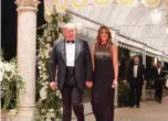  ??  ?? PALM BEACH: In this file photo taken on December 31, 2019 US President Donald Trump and First Lady Melania Trump arrive for a New Year’s celebratio­n at Mar-a-Lago in Palm Beach, Florida. President Donald Trump will leave Washington in disgrace next week, destined for a warmer welcome in Florida, where some supporters are so gung-ho they recently wrote his name on the back of a fat, lumbering manatee. — AFP