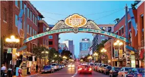  ?? COURTESY JOHN BAHU ?? The historic Gaslamp Quarter offers a perfect blend of the old and the new, as well as some of San Diego’s best shopping and nightlife.