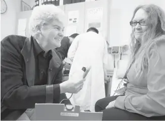  ?? Gavin Young/calgary Herald ?? Cardiologi­st Dr. Anne Gillis talks with patient Lillian Westling at the Foothills Hospital. Gillis has been instrument­al in establishi­ng a clinic at Foothills Hospital to remotely monitor heart patients for whom trips to the doctor can sometimes be...