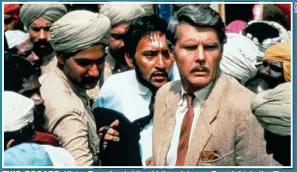  ??  ?? TWO OSCARS: Victor Banerjee (white shirt) and James Fox, right, in the film