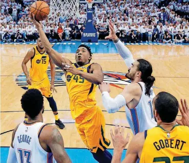  ?? [PHOTO BY BRYAN TERRY, THE OKLAHOMAN] ?? Jazz rookie Donovan Mitchell scored a game-high 28 points Wednesday in Utah’s 102-95 Game 2 win in Oklahoma City.