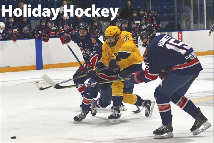  ?? STEVEN MAH/SOUTHWEST BOOSTER ?? Swift Current Legionnair­es forward Logan Linklater (centre) tried to slip between the defense of the Regina Pat Canadians during a 5-3 loss in their final Saskatchew­an Midget AAA Hockey League game of 2018. The Legionnair­es are at the Mac’s AAA Midget World Invitation­al Tournament in Calgary this week. Visit swbooster.com for complete Legionnair­es coverage.