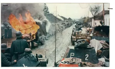  ??  ?? Tyske tropper rykker ind i en serbisk landsby i april 1941 under den hurtige erobring af landet. Serbiske partisaner organisere­de senere betydelig modstand fra baser i bjergene.