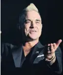  ?? FOTO: AP ?? NYTT ALBUM:
4- november slipper Robbie Williams sitt ellevte studioalbu­m,