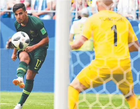  ??  ?? STRIKING DISTANCE: Daniel Arzani shoots at goal during the Socceroos 1-1 draw against Denmark at the World Cup. Picture: AAP/DEAN LEWINS