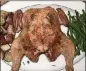  ?? CONTRIBUTE­D BY KELLIE HYNES ?? Because it lies flat, a spatchcock­ed chicken roasts evenly in just 45 minutes.