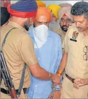  ?? HT PHOTO ?? Karamjit Singh Bains, brother of former MLA Simarjeet Singh Bains, being produced in a Ludhiana court on Sunday.