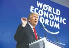  ?? THE ASSOCIATED PRESS ?? President Donald Trump delivers a speech to the World Economic Forum on Friday in Davos, Switzerlan­d.