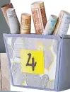  ??  ?? Turn your old basket into a newspaper and magazine rack. You can also cover it with handmade paper sheets for an arty look
