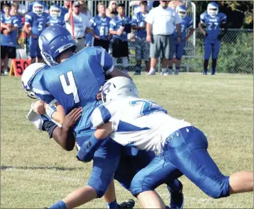  ??  ?? Tyrese McKrosky and Tye Whaley wrap up a Ringgold ball carrier during last week’s 22-6 NGAC semifinal victory. The Bulldogs will host Gordon Lee in Thursday’s title game. (Messenger photo/Scott Herpst)