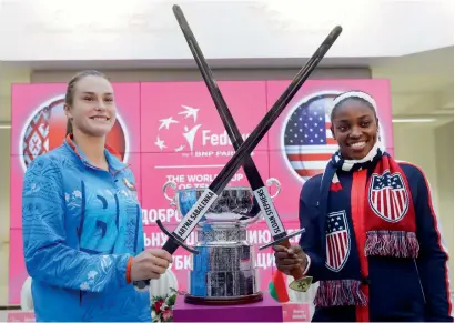  ?? AP ?? US Fed Cup team member Sloane Stephens (right) and Belarus’ team player Aryna Sabalenka pose for a photo after draw ceremony. —