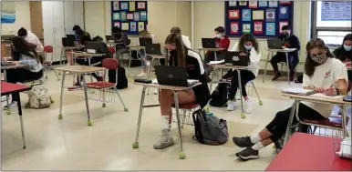  ?? SUBMITTED PHOTO ?? Students take to the books in a West Chester Area School District classroom.