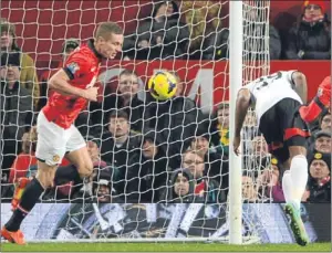  ?? Picture: Getty Images. ?? Darren Bent stoops to head in Fulham’s last-gasp leveller at Old Trafford yesterday.