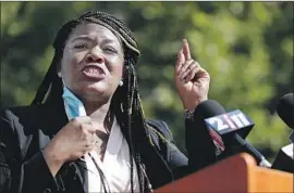  ?? Jeff Roberson Associated Press ?? CORI BUSH, a once-homeless woman who led protests in Ferguson, Mo., in 2014, defeated Rep. William Lacy Clay on Tuesday in Missouri’s Democratic primary.