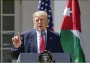  ?? SUSAN WALSH / ASSOCIATED PRESS ?? President Donald Trump talks about the attack in Syria during a news conference with Jordan’s King Abdullah II on Wednesday in the Rose Garden of the White House in Washington.