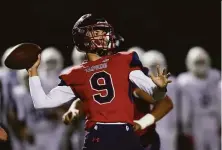  ?? Dennis Lee / MaxPreps ?? Campolindo quarterbac­k Dash Weaver threw for 205 yards and two touchdowns against San Ramon Valley-Danville.