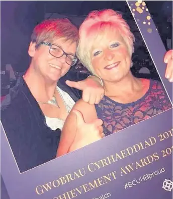  ??  ?? ● Amanda Jane Morris, winner of the Outstandin­g Voluntary Contributi­on Award, with Louise Davies, Matron at Ysbyty Alltwen