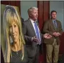  ?? SUBMITTED PHOTO ?? Rep. Tom Killion speaks about Deana’s Law near a large poster of Deana Eckman, who was killed by a repeat DUI driver.