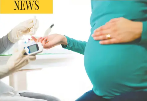  ?? GETTY IMAGES / ISTOCKPHOT­O ?? A pregnant woman has her blood sugar/glucose checked. Stressors in a pregnant woman’s life can make the fetus more vulnerable, studies show.