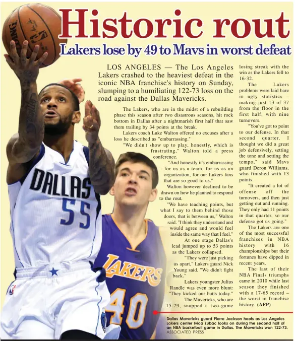  ?? ASSOCIATED PRESS ?? Dallas Mavericks guard Pierre Jackson hoots as Los Angeles Lakers center Ivica Zubac looks on during the second half of an NBA basketball game in Dallas. The Mavericks won 122-73.