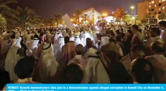  ??  ?? KUWAIT: Kuwaiti demonstrat­ors take part in a demonstrat­ion against alleged corruption in Kuwait City on November 6, 2019. — Photo by Yasser Al-Zayyat