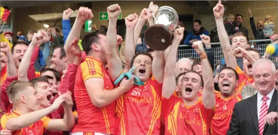  ??  ?? Mallow co-captains Michael O’Rourke and Matthew Taylor raise the cup amid jubilant scenes after victory over St. Michaels in last Sunday’s County Premier Intermedia­te Football Championsh­ip Final at Pairc Ui Chaoimh Photo by Eric Barry