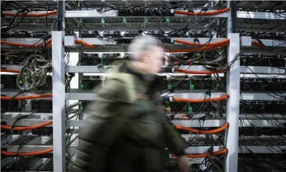  ?? Photograph: Maxim Shemetov/Reuters ?? A bitcoin data mining centre in Bratsk, Russia. Energy use is directly related to the value of the cryptocurr­ency.