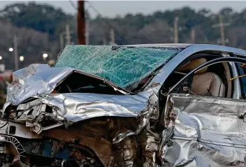  ?? Yi-Chin Lee / Staff file photo ?? This smashed car was involved in a three-vehicle fatal crash on the North Freeway in 2020. Texas’ 1,695 alcohol-related roadway deaths topped the nation in 2018.