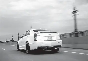  ?? Photograph­s by Cadillac ?? TO HELP buyers get the most out of their CTS-V, Cadillac has thoughtful­ly included in the price of the car two days of “performanc­e training” at a race track. The eight-speed transmissi­on comes with a track mode.