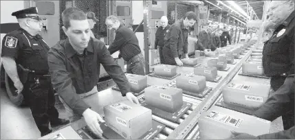  ??  ?? TRYING TO KEEP UP: Rapid shipments of packages containing Vault Bricks loaded with valuable .999 solid U.S. State Silver Bars are flowing around the clock from the private vaults of the Federated Mint to U.S. State residents who call 1-888-414-4671 to...