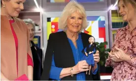  ?? Photograph: Paul Grover/AP ?? Camilla with a Barbie doll in her image at a reception for the Women of the World festival in London.