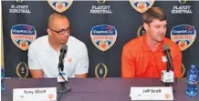  ?? AP FILE PHOTO/GASTON DE CARDENAS ?? Clemson co-offensive coordinato­rs Tony Elliott, left, and Jeff Scott have received raises upping the annual salary for each to $1 million.