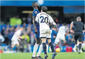  ??  ?? Mismatch: Bernard appears to aim a butt at Chelsea’s Antonio Rudiger