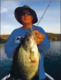  ?? COURTESY PHOTO ?? Ed Legan of Clear Lake Crappie Guide Service holds up a nice catch.