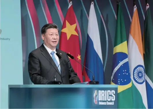  ??  ?? On November 14, 2019, the 11th BRICS leaders’ meeting is held in Brasilia, the capital of Brazil, chaired by Brazilian President Bolsonaro, and attended by Chinese President Xi Jinping, Russian President Putin, Indian Prime Minister Modi, and South African President Ramaphosa. Photo shows that President Xi Jinping attends the BRICS Business Forum and delivers a keynote speech. (photo/Xinhua)