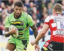 ??  ?? Intensity: Courtney Lawes