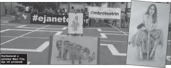  ??  ?? Karikatura­t e artistes Meri File, dje në protestë