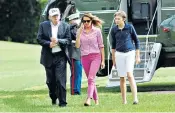  ??  ?? Donald Trump and family return to Washington from Camp David