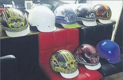  ?? Lynn curwin/truro daily news ?? Duane LeBlanc’s helmet artwork is well known. Now he and his wife Renee are also assembling helmets, as the new owners of Grattan Helmets.