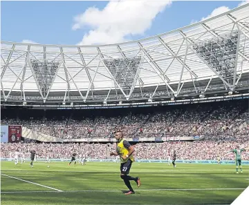  ??  ?? ■ Dimitri Payet warms up at the London Stadium. Now he’s looking for the exit door.