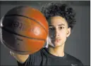  ?? Richard Brian ?? Las Vegas Review-journal Vegas Elite point guard Richard Isaacs is supremely confident but says he never expected UNLV’S scholarshi­p offer. “I was just grateful for that moment,” he says.