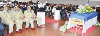  ??  ?? Senior police officers (left) follow proceeding­s at the funeral service of the late former ZRP Senior Assistant Commission­er Boyathi Ngwenya at the United Congregati­on Church of Southern Africa in Bulawayo yesterday