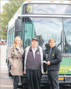  ?? SUBMITTED PHOTO ?? Ivan Proud, a driver who has been with T3 Transit since it began on Sept. 30, 2005, is shown with T3 Transit owner Mike Cassidy, right, and the City of Charlottet­own’s Sustainabi­lity Officer Ramona Doyle.