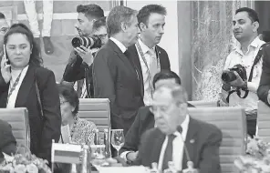  ?? OLIVIER DOULIERY/ AP ?? U. S. Secretary of State Antony Blinken, top center, walks past Russian Foreign Minister Sergey Lavrov at the G- 20 foreign ministers’ meeting in New Delhi, on Thursday.