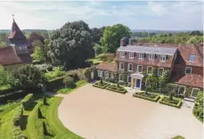  ??  ?? Above: Martyr Worthy Manor, Hampshire, sold for about £4.65m. Below: Bowhill House, West Sussex, went for £5.15m against a guide of £4.95m